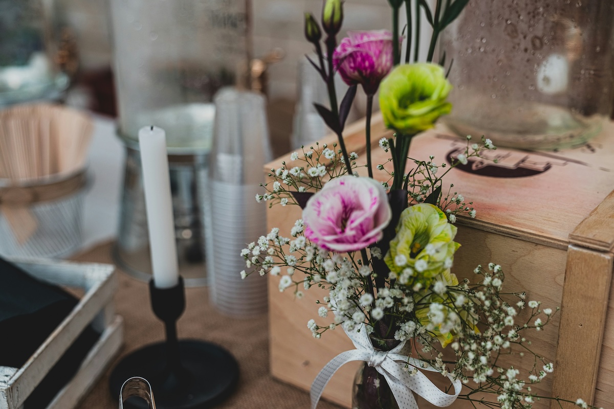 Flowers hung on a wall at a venue